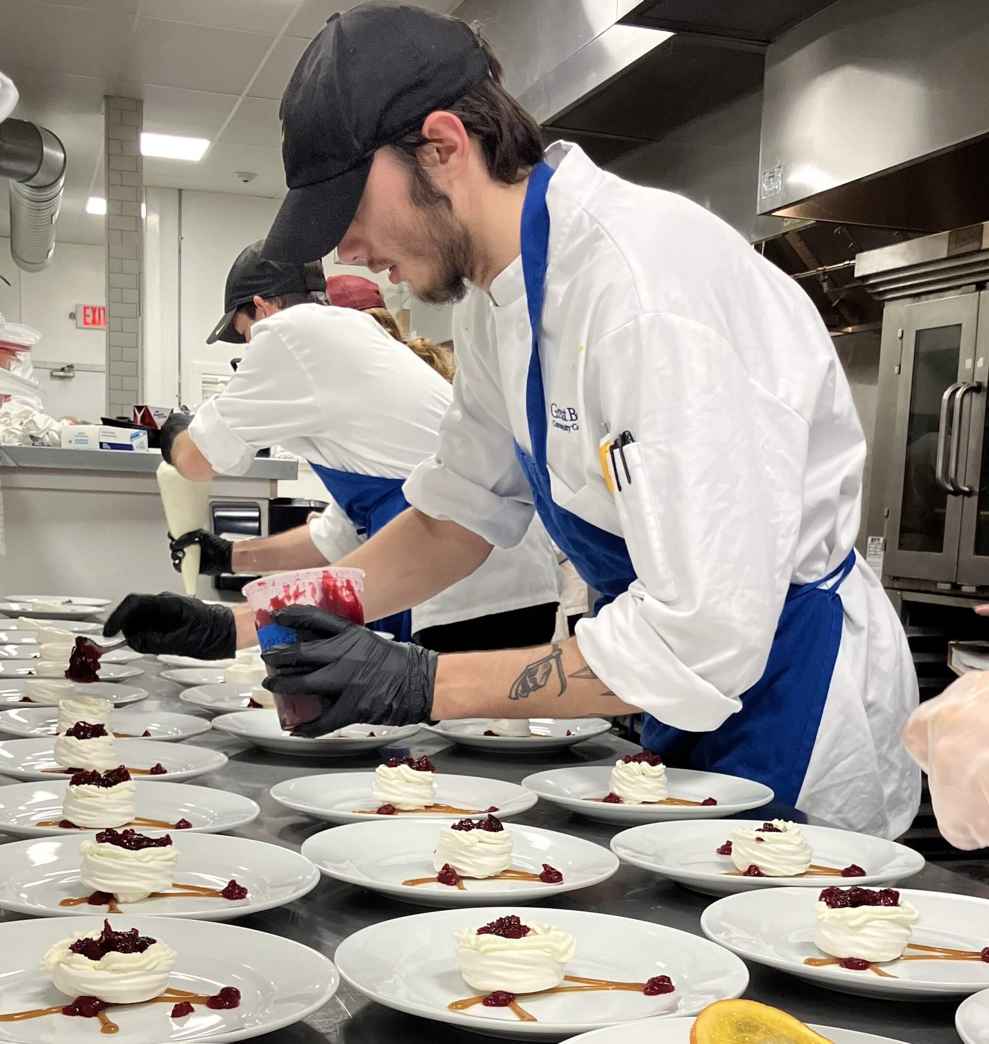 GBCC Culinary Student plating desserts